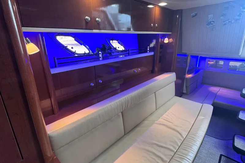  Yacht Photos Pics Luxurious interior of 2008 Sea Ray 350 Sundancer yacht with blue ambient lighting.