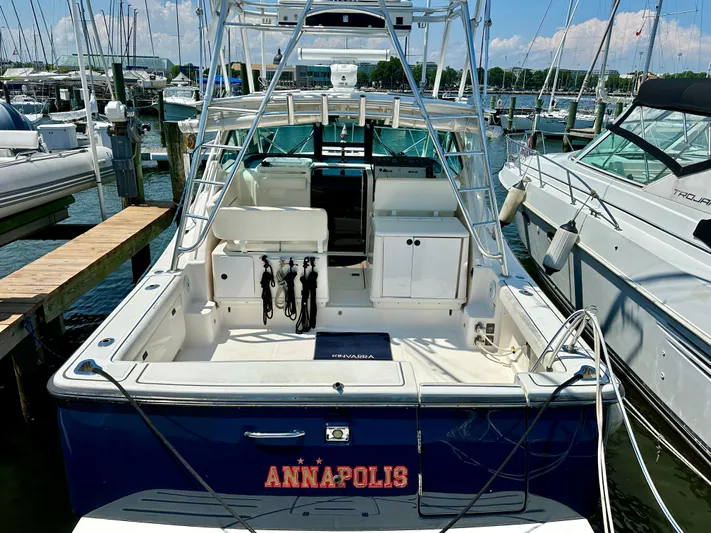  Yacht Photos Pics 2004 Tiara Yachts 3200 Open docked at marina, rear view.