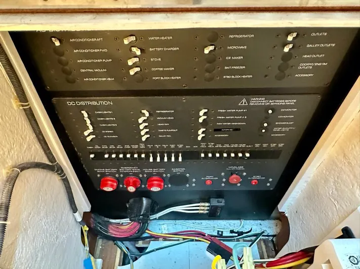  Yacht Photos Pics Electrical panel of a 2004 Tiara Yachts 3200 Open, showing switches and wiring.