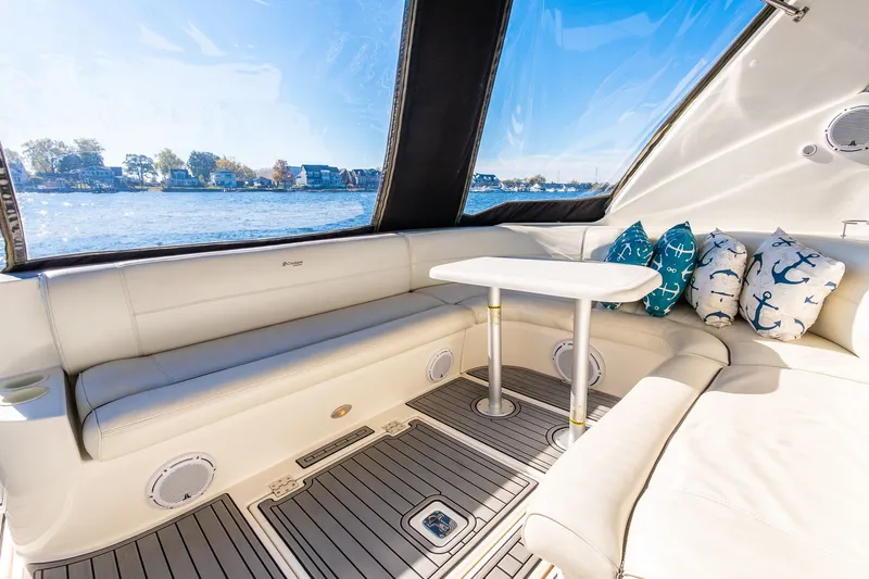 Escape Yacht Photos Pics Luxurious 2005 Cruisers Yachts 440 Express interior with scenic waterfront view.