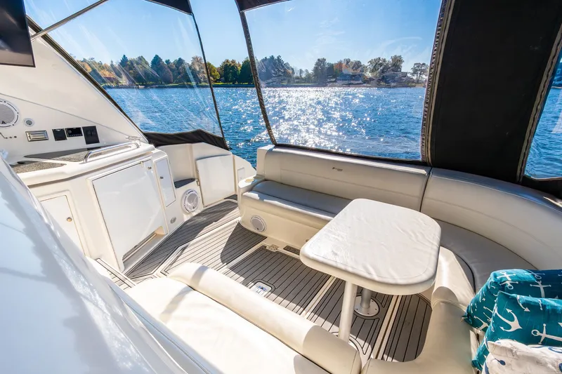 Escape Yacht Photos Pics Luxurious 2005 Cruisers Yachts 440 Express interior with scenic water view.