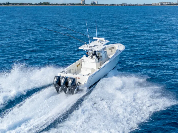 Remote Work Yacht Photos Pics 2021 SeaVee 370z boat cruising at high speed on open water.