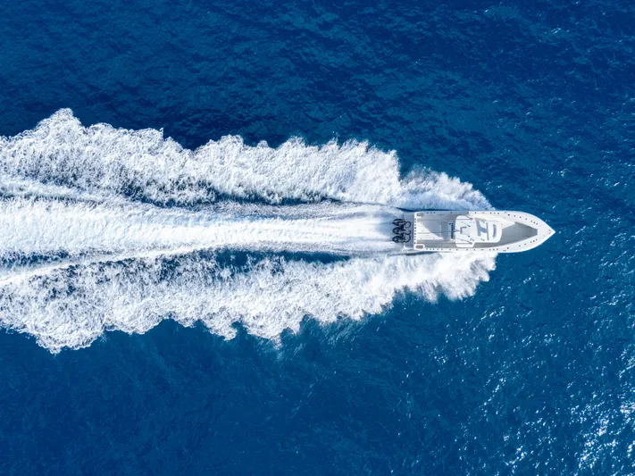 Remote Work Yacht Photos Pics Aerial view of 2021 SeaVee 370z boat on open sea.