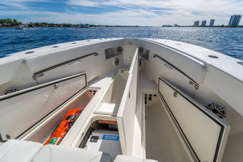 Remote Work Yacht Photos Pics Interior view of 2021 SeaVee 370z boat with storage compartments.