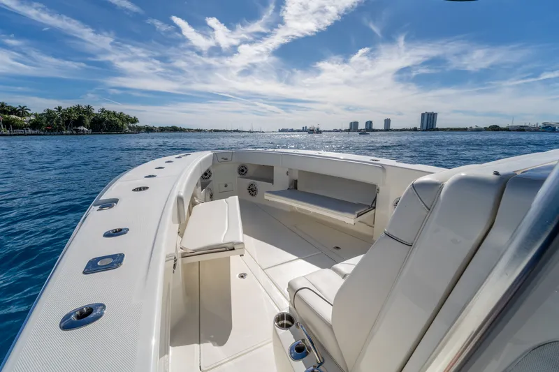 Remote Work Yacht Photos Pics SeaVee 370z boat 2021 on calm water under clear sky.