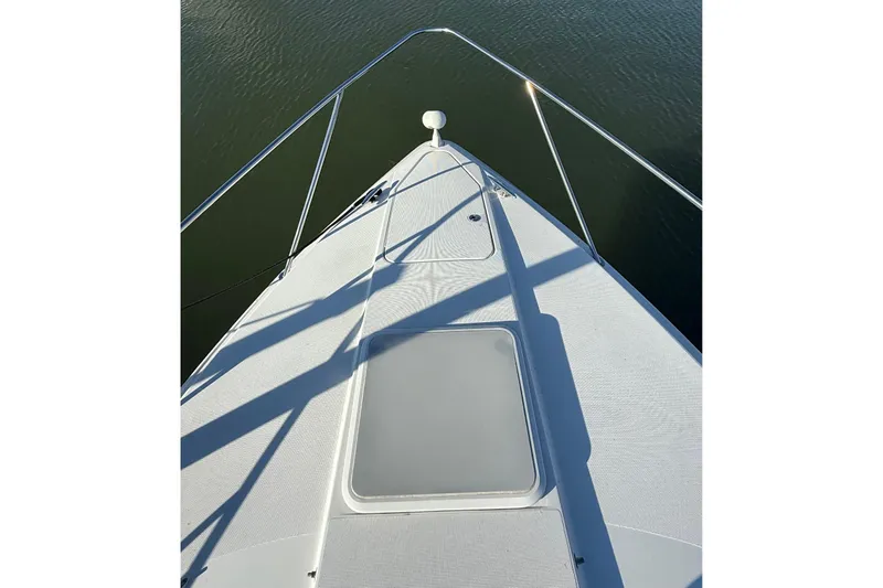 Dream Maker II Yacht Photos Pics Bow view of 2005 Formula 37 Performance Cruiser on calm water.