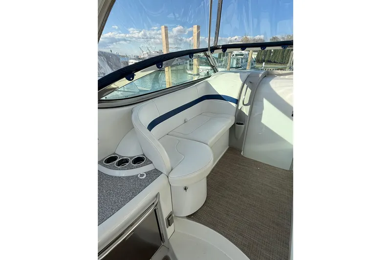 Dream Maker II Yacht Photos Pics 2005 Formula 37 Performance Cruiser interior with white seating and blue accents.