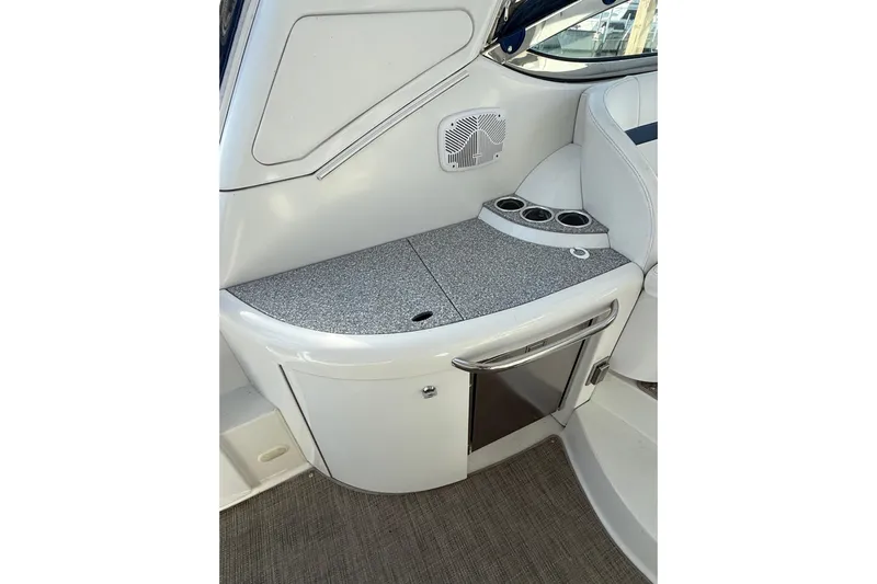 Dream Maker II Yacht Photos Pics 2005 Formula 37 Performance Cruiser interior with countertop, cup holders, and storage.