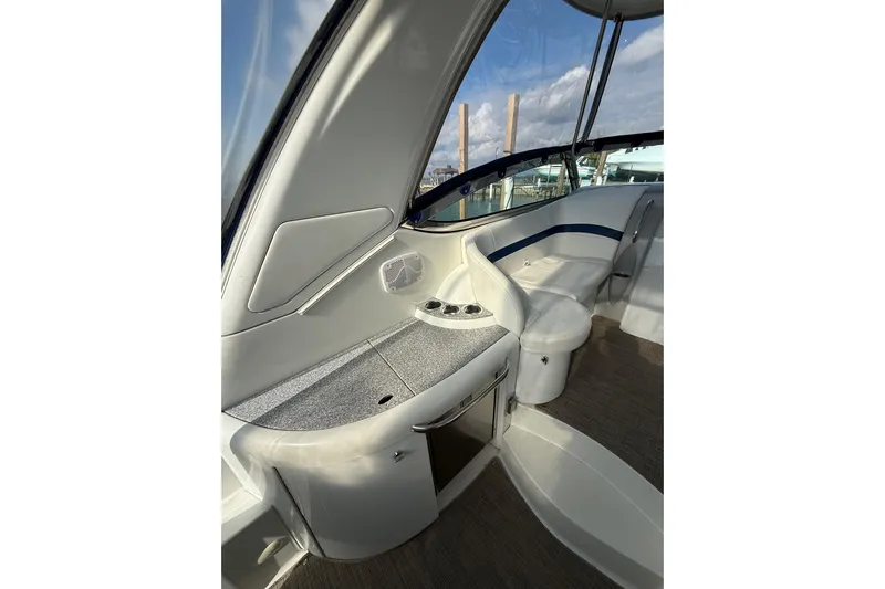 Dream Maker II Yacht Photos Pics 2005 Formula 37 Performance Cruiser interior with seating and storage.