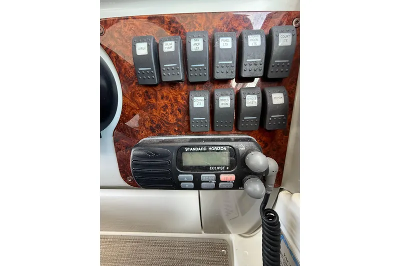 Dream Maker II Yacht Photos Pics Control panel and radio on a 2005 Formula 37 Performance Cruiser boat.
