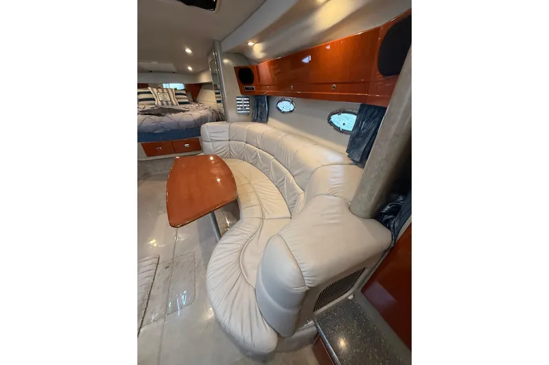 Dream Maker II Yacht Photos Pics 2005 Formula 37 Performance Cruiser interior with plush seating and wooden accents.