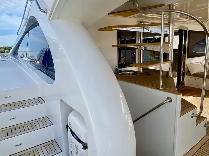 Clouds Yacht Photos Pics Staircase and deck of 2013 Sunreef 70 Power yacht with modern design.