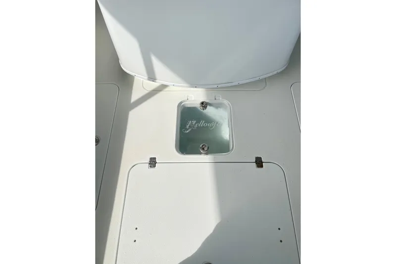  Yacht Photos Pics 2018 Yellowfin 36 Offshore boat deck with storage compartments.
