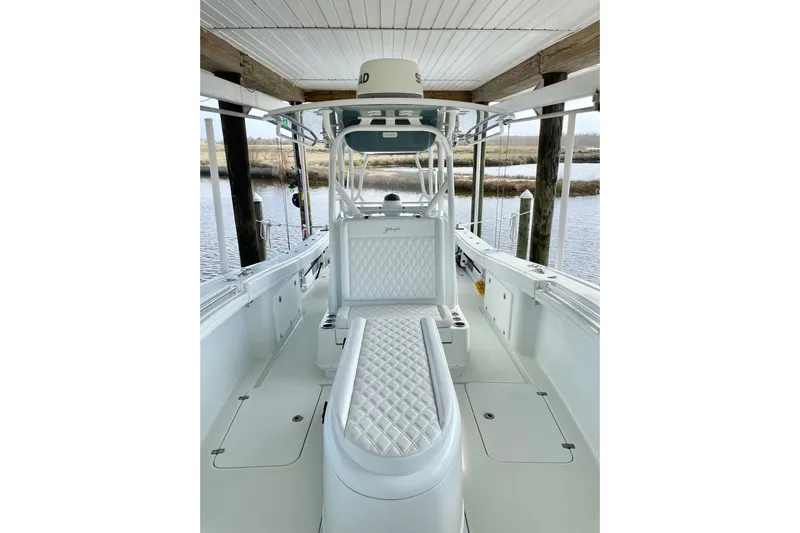  Yacht Photos Pics 2018 Yellowfin 36 Offshore boat interior with white seating and sleek design.