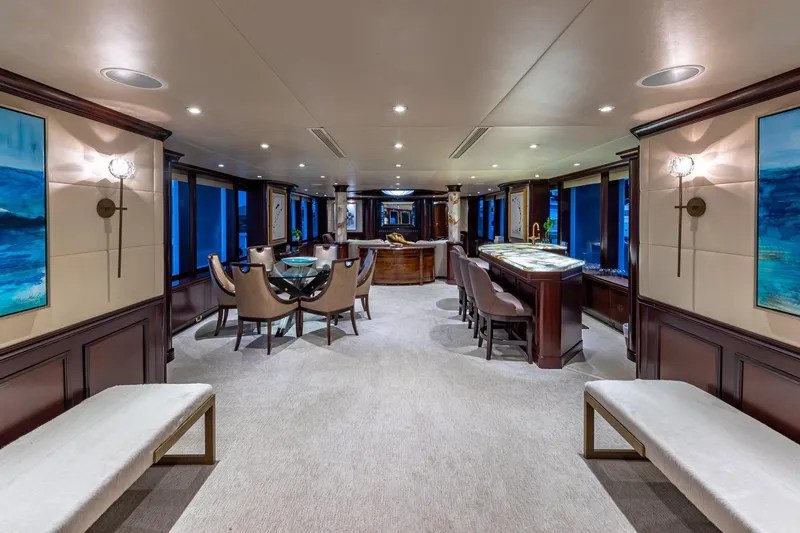 Starship Yacht Photos Pics Luxurious 1988 Van Mill Custom yacht interior with elegant dining and bar area.