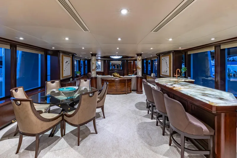 Starship Yacht Photos Pics Luxurious 1988 Van Mill Custom yacht interior with elegant dining and bar area.