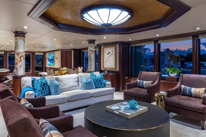 Starship Yacht Photos Pics Luxurious 1988 Van Mill Custom yacht interior with elegant seating and ambient lighting.
