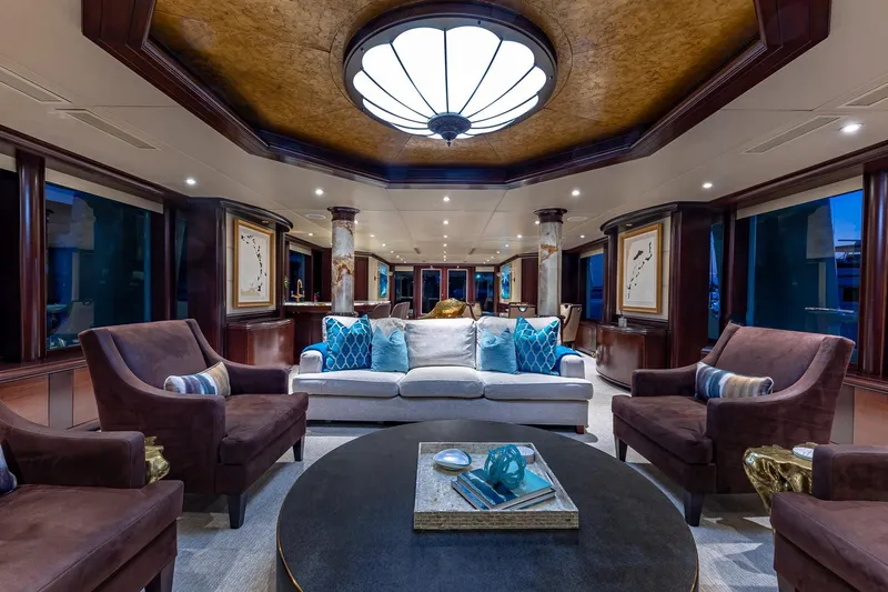 Starship Yacht Photos Pics Luxurious interior of 1988 Van Mill Custom yacht with elegant seating and ambient lighting.