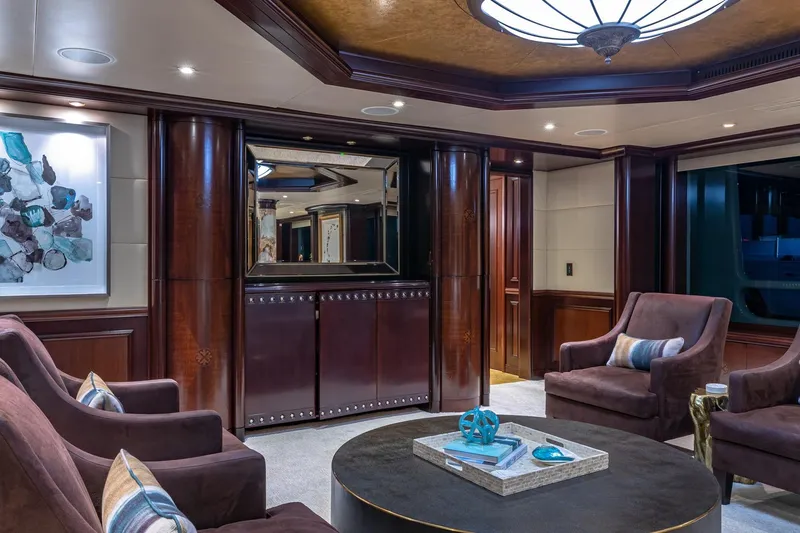 Starship Yacht Photos Pics Luxurious yacht interior with elegant seating, modern art, and ambient lighting, Van Mill Custom 1988.