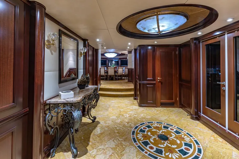 Starship Yacht Photos Pics Luxurious 1988 Van Mill Custom yacht interior with elegant wood paneling and ornate decor.