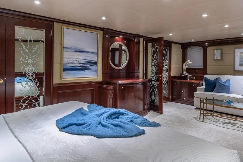 Starship Yacht Photos Pics Luxurious 1988 Van Mill Custom yacht interior with elegant wood paneling and modern decor.