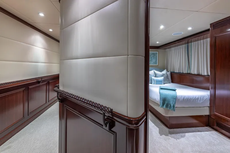 Starship Yacht Photos Pics Luxurious 1988 Van Mill Custom yacht interior with elegant wood paneling and cozy bedroom.