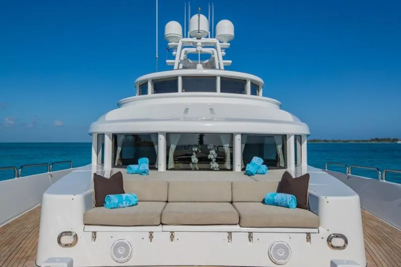Starship Yacht Photos Pics Luxury 1988 Van Mill Custom yacht deck with seating, ocean view, and clear blue sky.