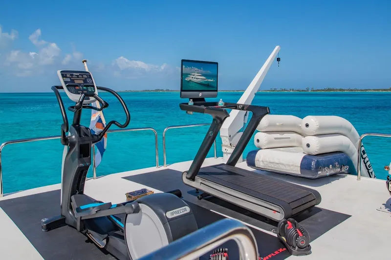 Starship Yacht Photos Pics Outdoor gym on a 1988 Van Mill Custom yacht with ocean view.