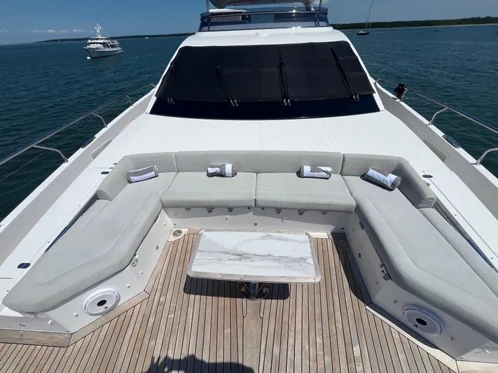 Mastermind Yacht Photos Pics Luxurious 2019 Azimut Grande 27M yacht with spacious deck seating and ocean view.