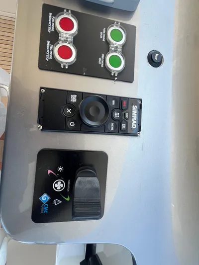 Mastermind Yacht Photos Pics Control panel of a 2019 Azimut Grande 27M yacht with Simrad navigation system.