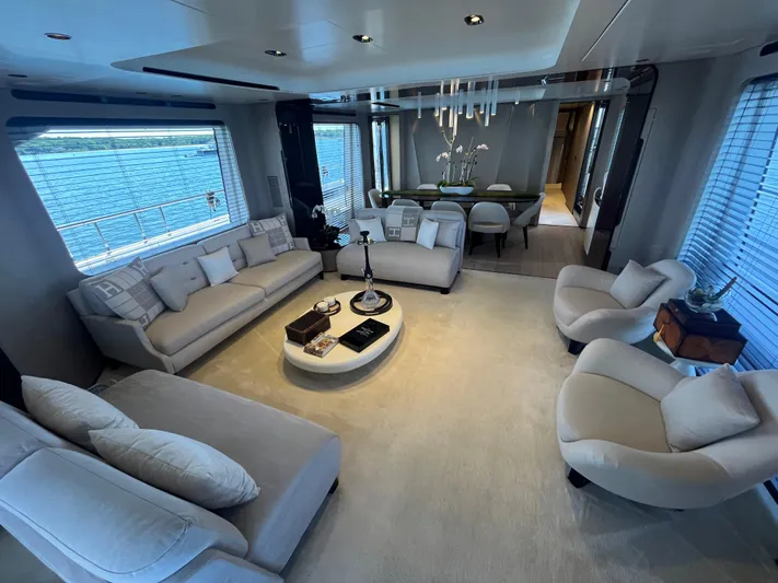 Mastermind Yacht Photos Pics Luxurious interior of 2019 Azimut Grande 27M yacht with elegant seating and modern decor.