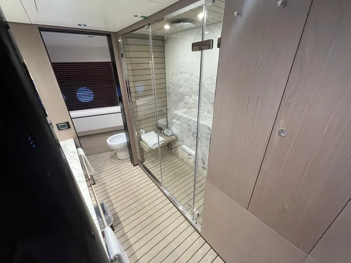Mastermind Yacht Photos Pics Luxurious bathroom on 2019 Azimut Grande 27M yacht with modern design and glass shower.