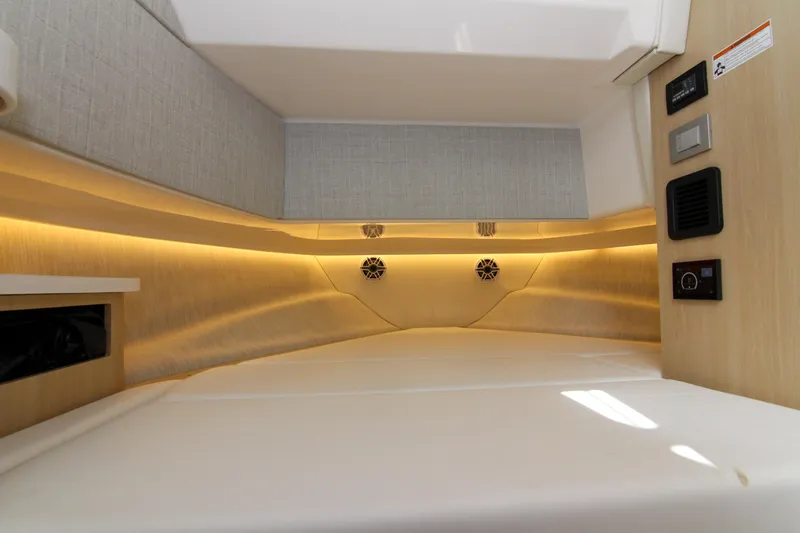  Yacht Photos Pics 2023 Regal 38 SAV cabin interior with ambient lighting and modern design.