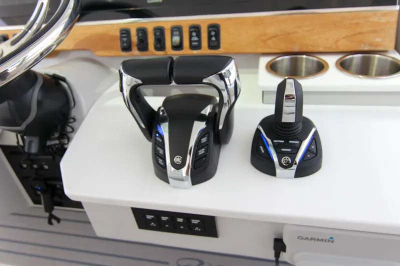  Yacht Photos Pics 2023 Regal 38 SAV boat controls with joystick and throttle levers.