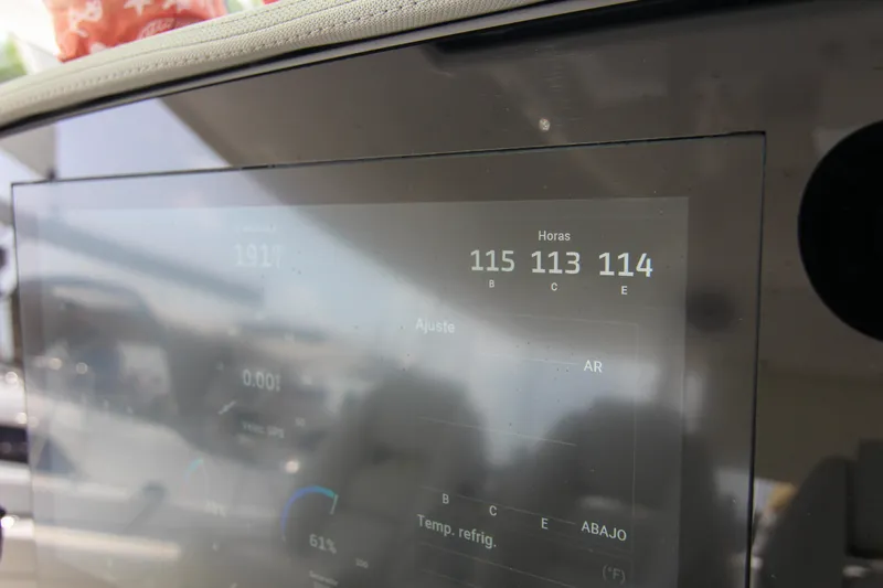  Yacht Photos Pics Display screen on 2023 Regal 38 SAV boat showing operational data and settings.