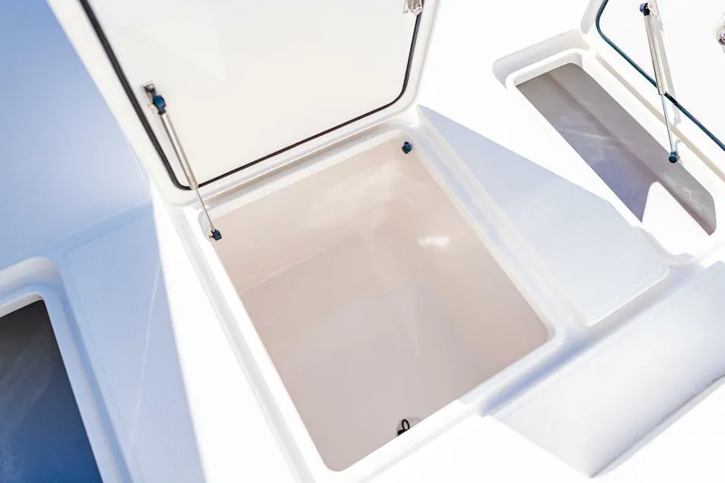  Yacht Photos Pics Open storage compartment on 2015 Invincible 33 Open Fisherman boat.
