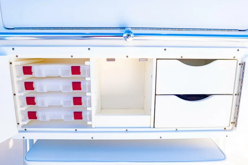  Yacht Photos Pics 2015 Invincible 33 Open Fisherman storage compartments with tackle boxes and drawers.