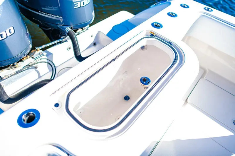  Yacht Photos Pics 2015 Invincible 33 Open Fisherman boat with dual 300 engines and livewell.