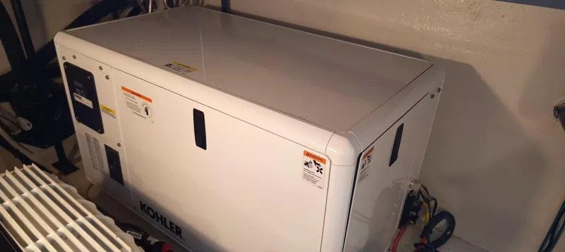 2016 Four Winns H440 Yacht Photos Pics Kohler generator in 2016 Four Winns H440 boat engine room.