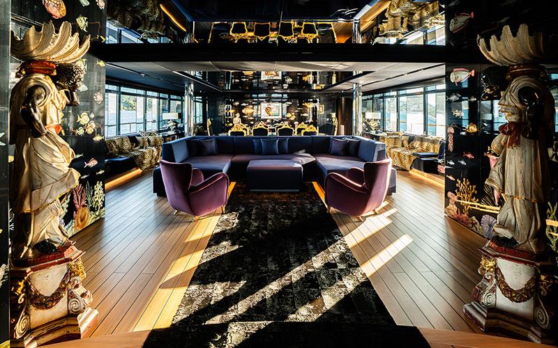 Luxurious interior of 2019 Codecasa F74 yacht with elegant decor and plush seating.