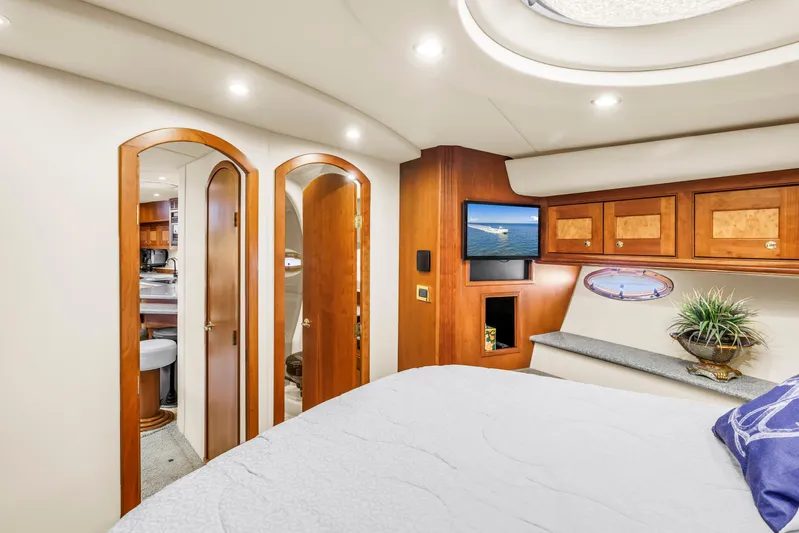  Yacht Photos Pics Luxurious 2002 Cruisers 5370 yacht interior with wood accents and modern amenities.