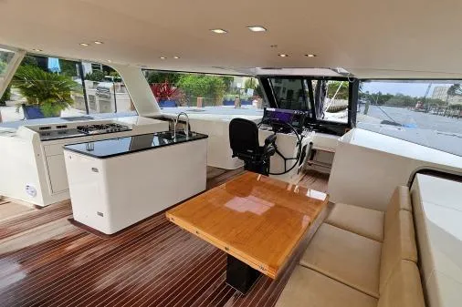 Vandal Yacht Photos Pics Interior of 2014 Gunboat 55 yacht with modern kitchen and seating area.