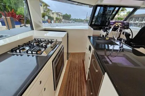 Vandal Yacht Photos Pics Interior of 2014 Gunboat 55 yacht with modern kitchen and sleek design.