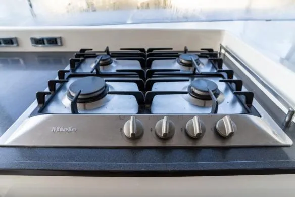 Vandal Yacht Photos Pics Stainless steel gas stove with four burners on a Gunboat 55 yacht, 2014 model.