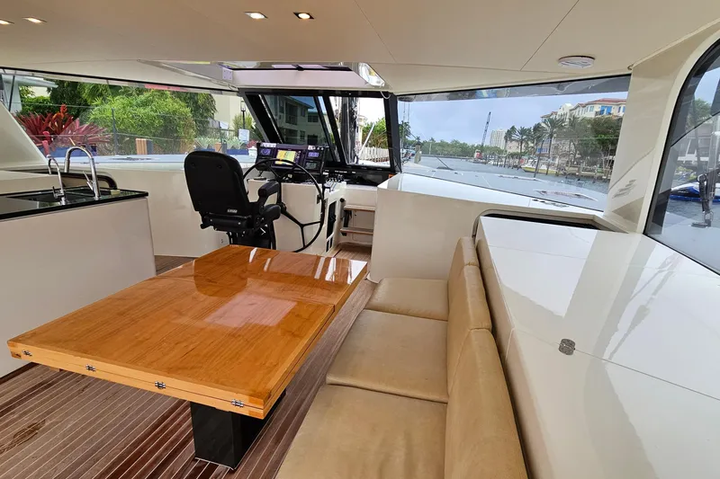 Vandal Yacht Photos Pics Luxurious interior of 2014 Gunboat 55 yacht with sleek design and modern amenities.