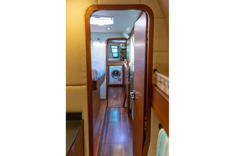 Vandal Yacht Photos Pics Interior view of 2014 Gunboat 55 yacht, featuring hallway and washer.