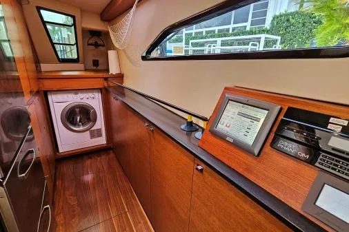 Vandal Yacht Photos Pics Interior of 2014 Gunboat 55 yacht with washer and control panel.