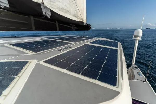 Vandal Yacht Photos Pics 2014 Gunboat 55 yacht with solar panels on deck, sailing on open water.