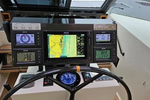 Vandal Yacht Photos Pics Cockpit of 2014 Gunboat 55 with navigation and control displays.