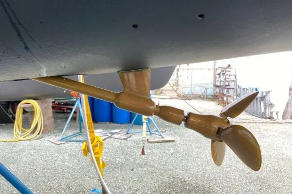 Vandal Yacht Photos Pics Propeller of 2014 Gunboat 55 yacht on dry dock, showcasing marine engineering.